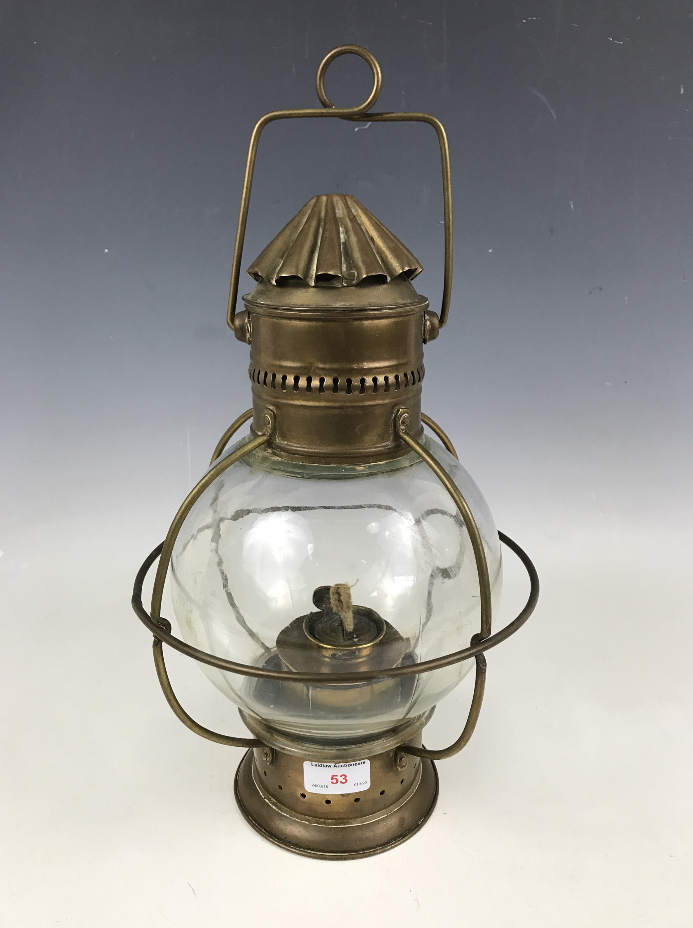 A ship's brass pendant masthead oil lamp