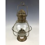 A ship's brass pendant masthead oil lamp