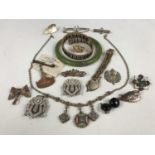 A quantity of vintage costume jewellery including a Blackpool Tower brooch