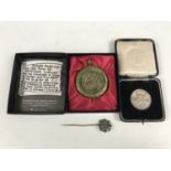 A 1930s cased silver golfing medallion, together with a stick pin and a Corocraft Robert the Bruce