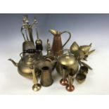 A quantity of brass ware including a kettle, jugs and a companion set etc