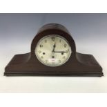 A George V mahogany "Napoleon hat" form mantel clock