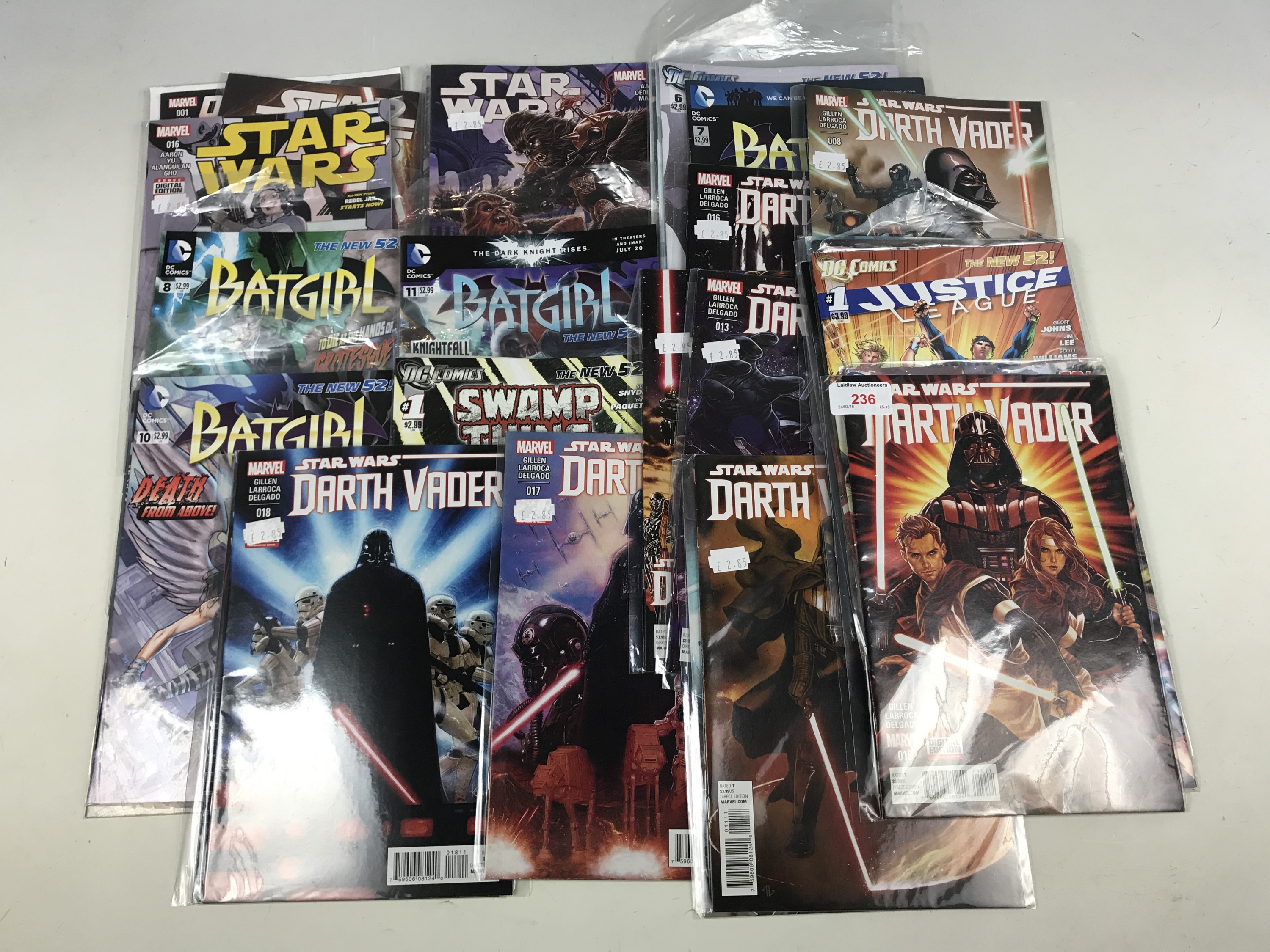 Various Marvel Star Wars comics together with Superman etc