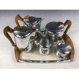 A six piece Picquot-ware tea set