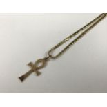 A yellow-metal Egyptian Ankh pendant and neck chain, (tested as gold), 5.4 g