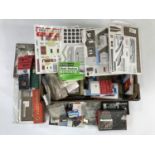 A large quantity of 'new old-stock' model railway accessories and building construction sets