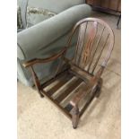 A 1920s child's Windsor influenced armchair