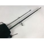 A Shakespeare Carbo 9' two-piece salmon spinning rod