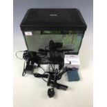 A small Aqua fish tank with light, pump and internal filter