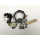 An early 20th Century doctor's wristlet watch, together with one further silver-cased watch and