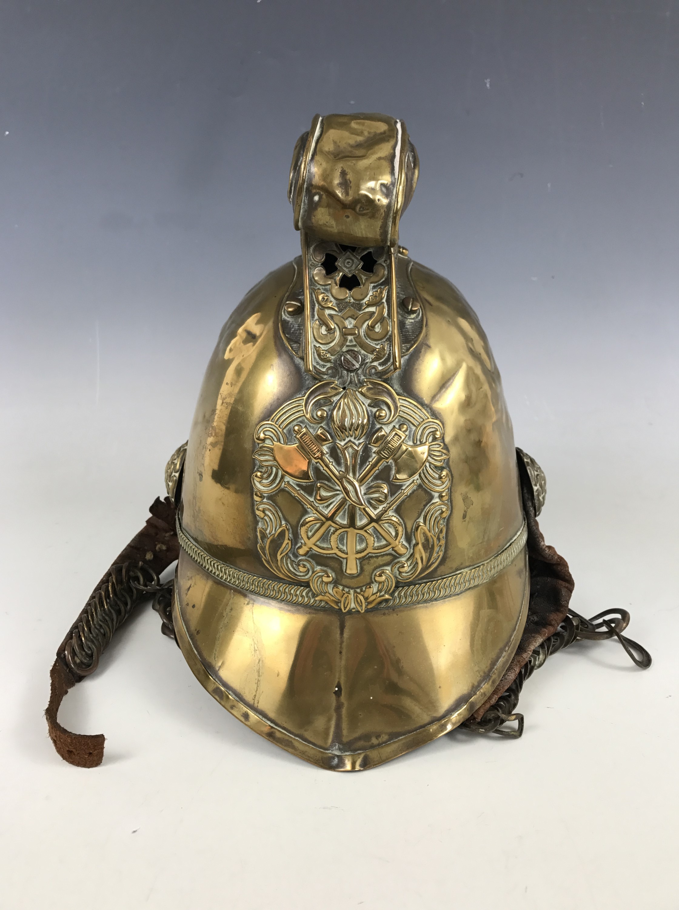 A late 19th / early 20th Century Merryweather pattern fireman other ranks' brass helmet,