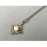 A 20th Century pearl and yellow-metal pendant necklace, the pearl set to the centre of