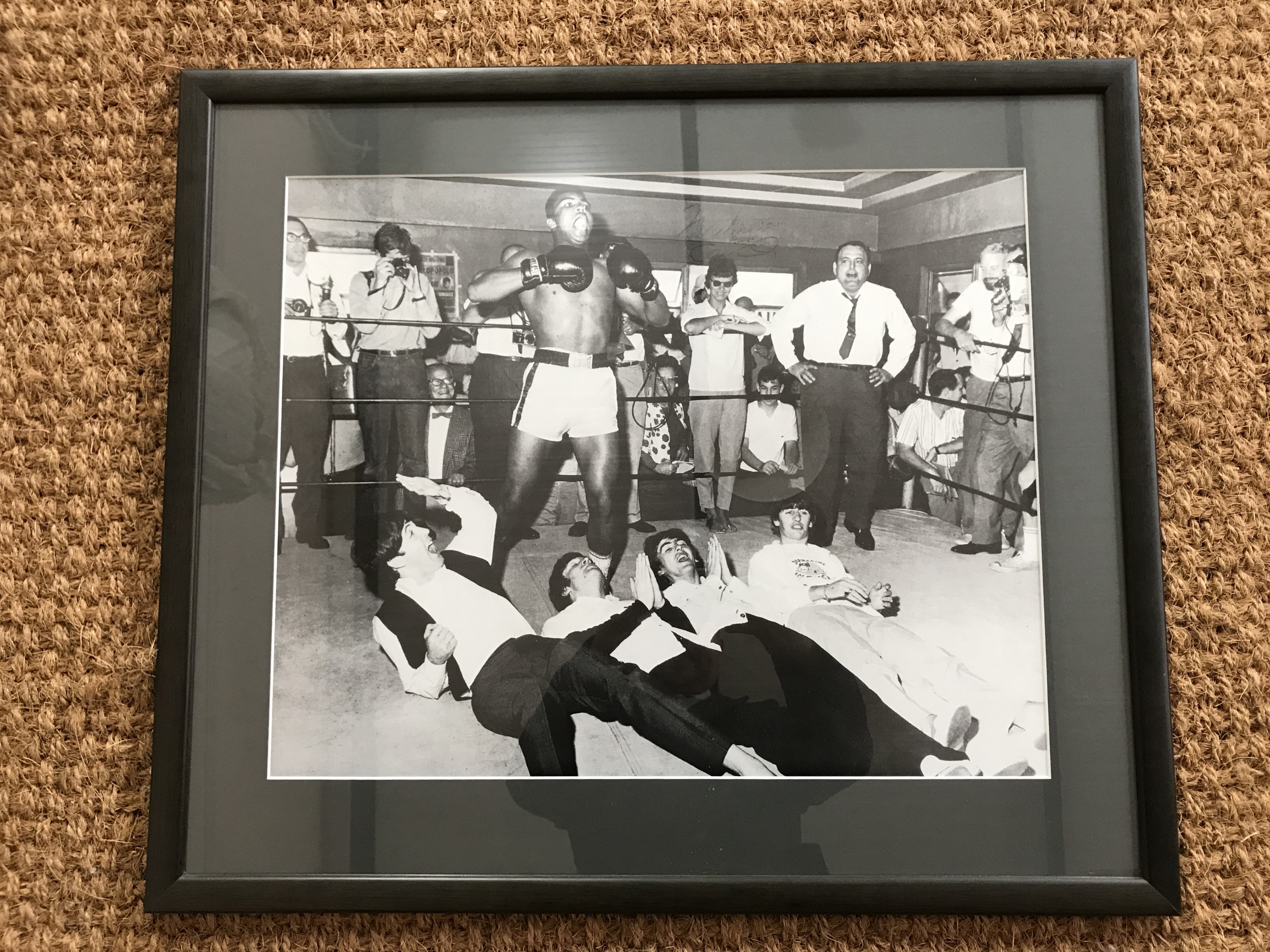 [Autograph / Muhammad Ali / The Beatles] Signed candid photographic print depicting Cassius Clay ( - Image 2 of 3