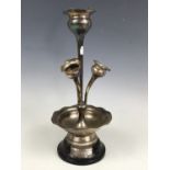 A late Victorian silver epergne, comprising a central bud vase of organic form, surrounded by