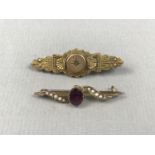 A Victorian diamond and 9ct gold Etruscan Revival bar brooch, having a locket back, together with an