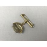 A yellow-metal mounted citrine swivel fob and 9ct gold T-bar converted to be worn as a brooch, 10.8g
