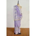 An early 20th Century Zoroastrian Parsi sari of lilac silk having a silver zardozi and sequin