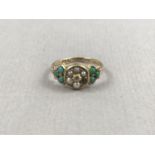 A late Victorian diamond, turquoise and seed pearl dress ring, having central flower-head