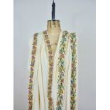 A mid 20th Century Zoroastrian Parsi sari of cream georgette having a kor / border of floral petit-