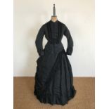 A Victorian black faille and satin three-piece dress retailed by Palmer of London, comprising