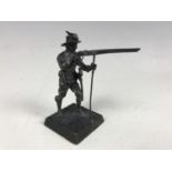 An Elizabeth II novelty silver statuette modelled in the form of a 17th Century musketeer, Mc K,