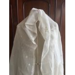 Four Zoroastrian Parsi prayer shawls of white linen, three having hand embroidered decoration, one