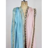 A 20th Century Zoroastrian Parsi sari of turquoise silk, having a satin stitched kor / border