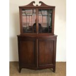 A George III inlaid mahogany bookcase cabinet, 84 cm x 189 cm