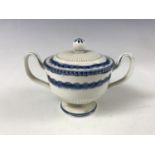 A Wedgwood creamware custard cup and cover, decorated with fine reeded moulding and underglaze