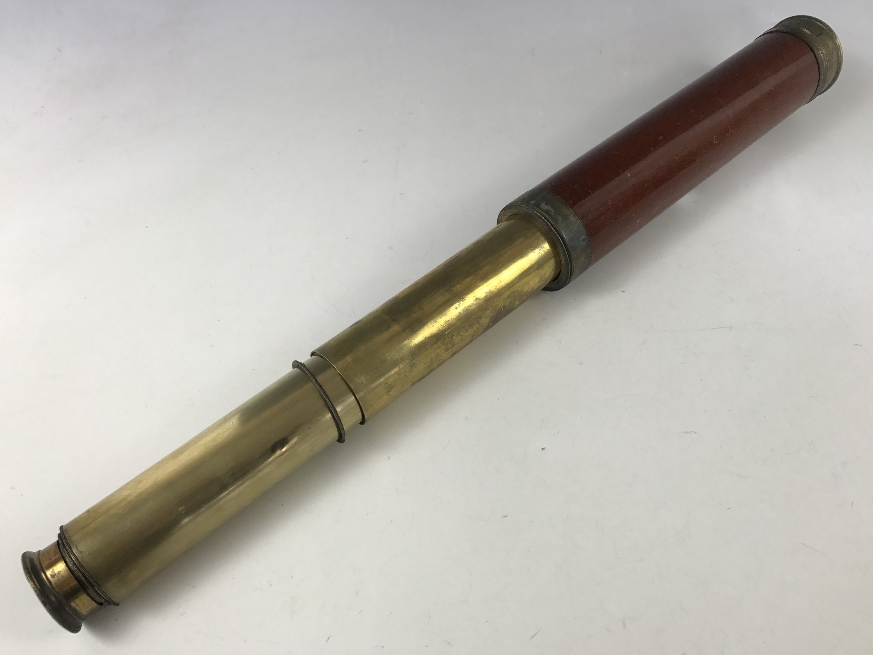 A Victorian mahogany and brass four draw telescope by Cox of London