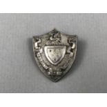 An Edwardian silver shield-shaped brooch bearing the arms of Whitehaven, Birmingham, 1904, 8.6g