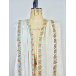 An early 20th Century Zoroastrian Parsi sari having a cream figured ground in a Moderne design and