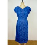 An early 1960s W. Lyons (Gowns) Ltd 'Lady in Black' range indigo blue two-piece lace wiggle dress
