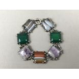 A Scottish silver and hardstone bracelet, comprising seven faceted and polished specimen stones,