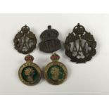 A small group of British military / home front women's insignia including Queen Mary's Army