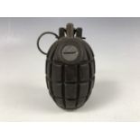 An inert post-War No 36 (Mills) grenade