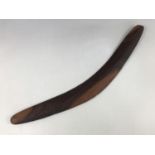 [Ethnic / Aborigine Art] An early 20th Century Australian Aboriginal carved mulga wood boomerang, 65