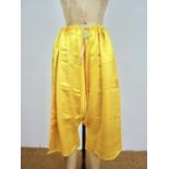 A pair of 20th Century Zoroastrian Parsi ijars of mustard yellow silk, embroidered 'P.P. 44', 75 x