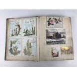 A late Victorian scrap album containing a collection of tipped-in Christmas cards, each with pen and