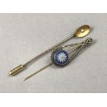 A Victorian high-carat yellow metal and split seed pearl stick pin, stamped 15ct, together with