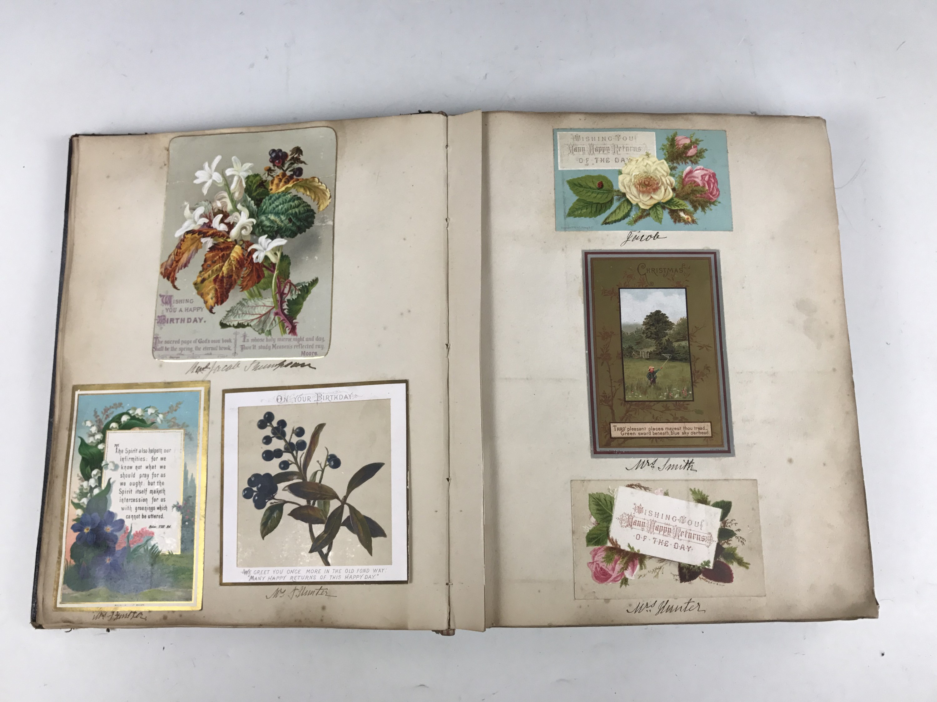 A late Victorian scrap album containing a collection of tipped-in Christmas cards, each with pen and - Image 3 of 5