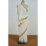 An early 20th Century Zoroastrian Parsi sari of cream chiffon having a kha-kha and satin-stitched