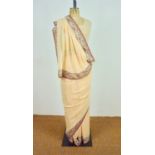 A late 19th / early 20th Century Zoroastrian Parsi sari and badan of peach chiffon, the sari