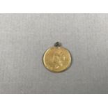 A United States of America Indian Princess One Dollar gold coin, with ring suspender