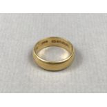 A 22ct gold wedding band, 6.8g