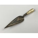 A Victorian silver novelty bookmark modelled in the form of a trowel, with mother of pearl handle,