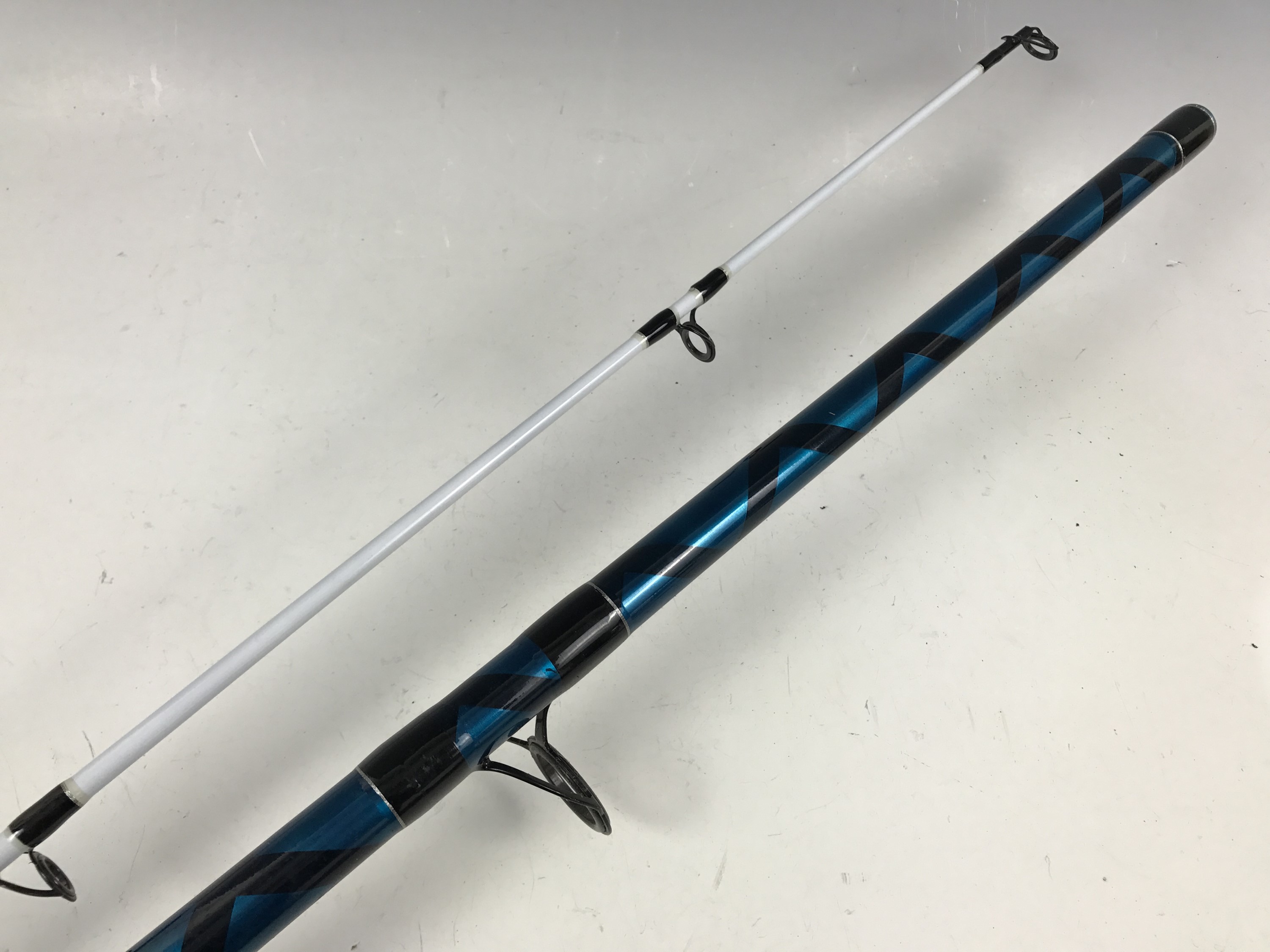 A Shakespeare Tidewater Beachcaster 12' two-piece fishing rod