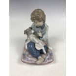 A Lladro figurine entitled Behave 5703