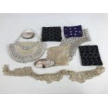 Victorian costume accessories including beadwork embroidered cuffs, two shell coin purses, beaded