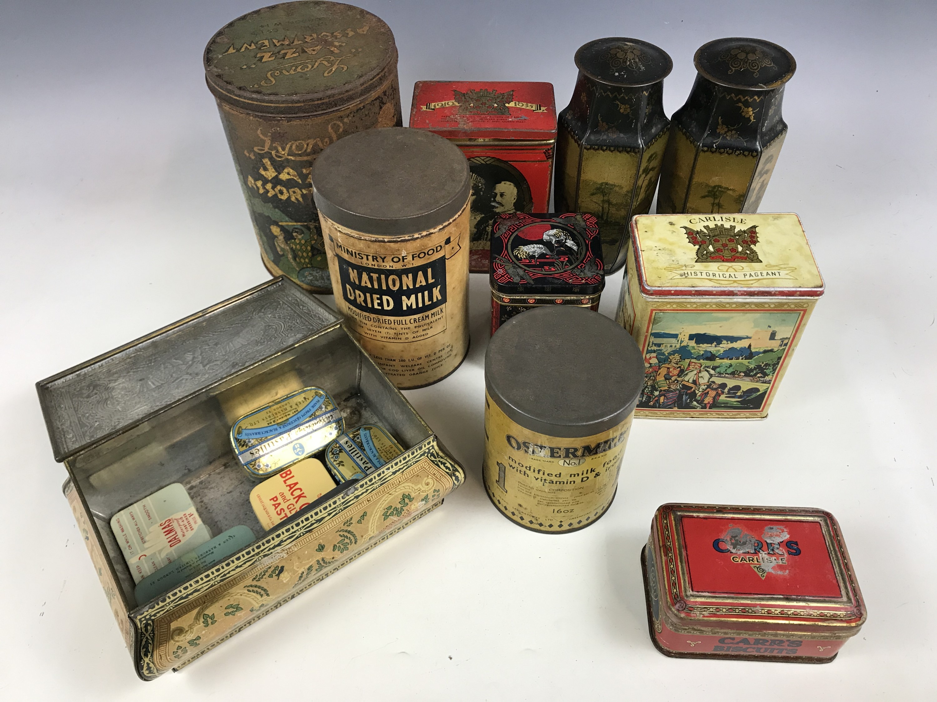 A number of vintage tins, including a 1920s Lyons "Jazz Assortment" sweet tin and a Second World War